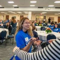 photo of student being given honor cord